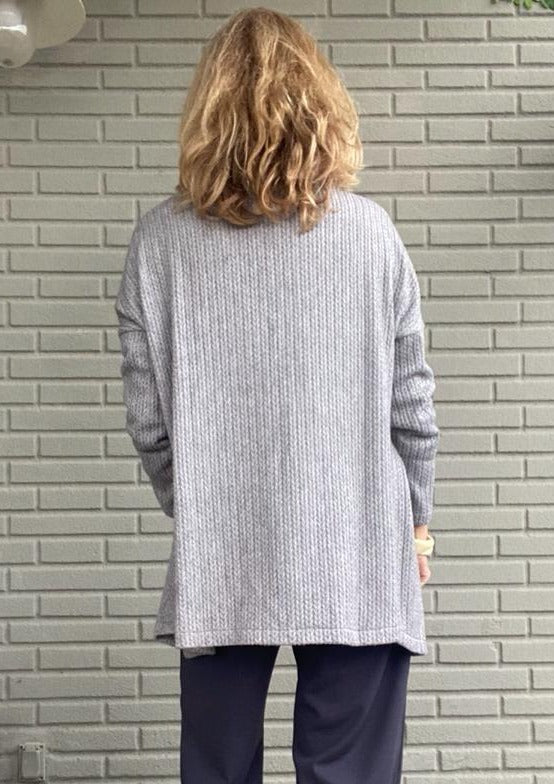 CHAQUETA LARGA TRENZA